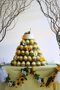 sunflower cupcake tree tiny bride drags tiny groom on tiny cake